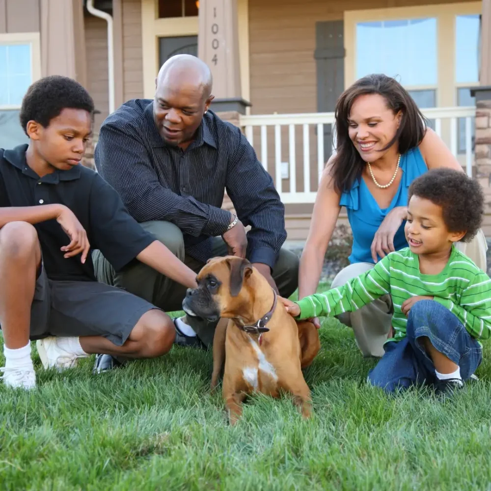 family outside with dog